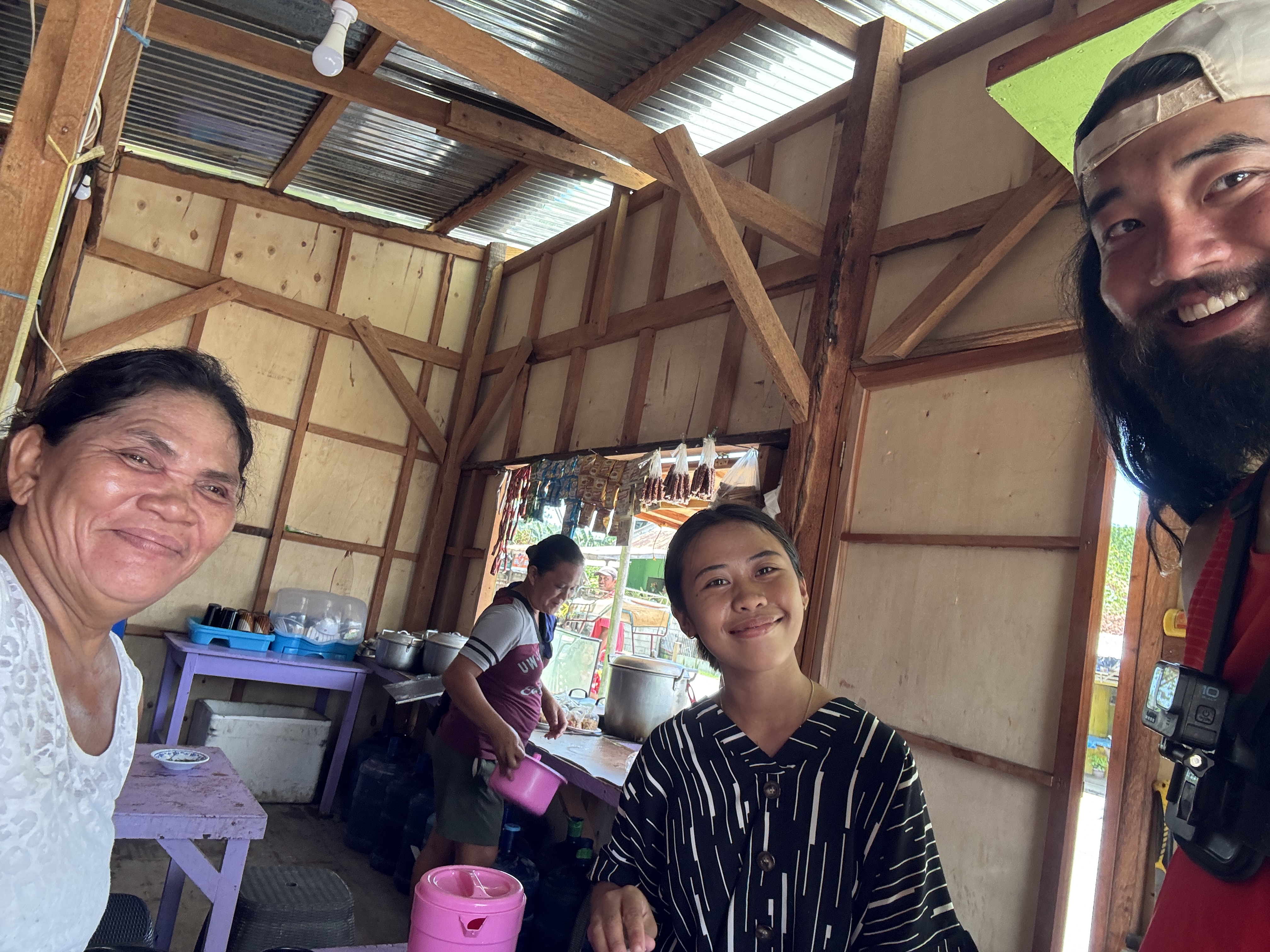 Friendly staff at a carinderia along the route