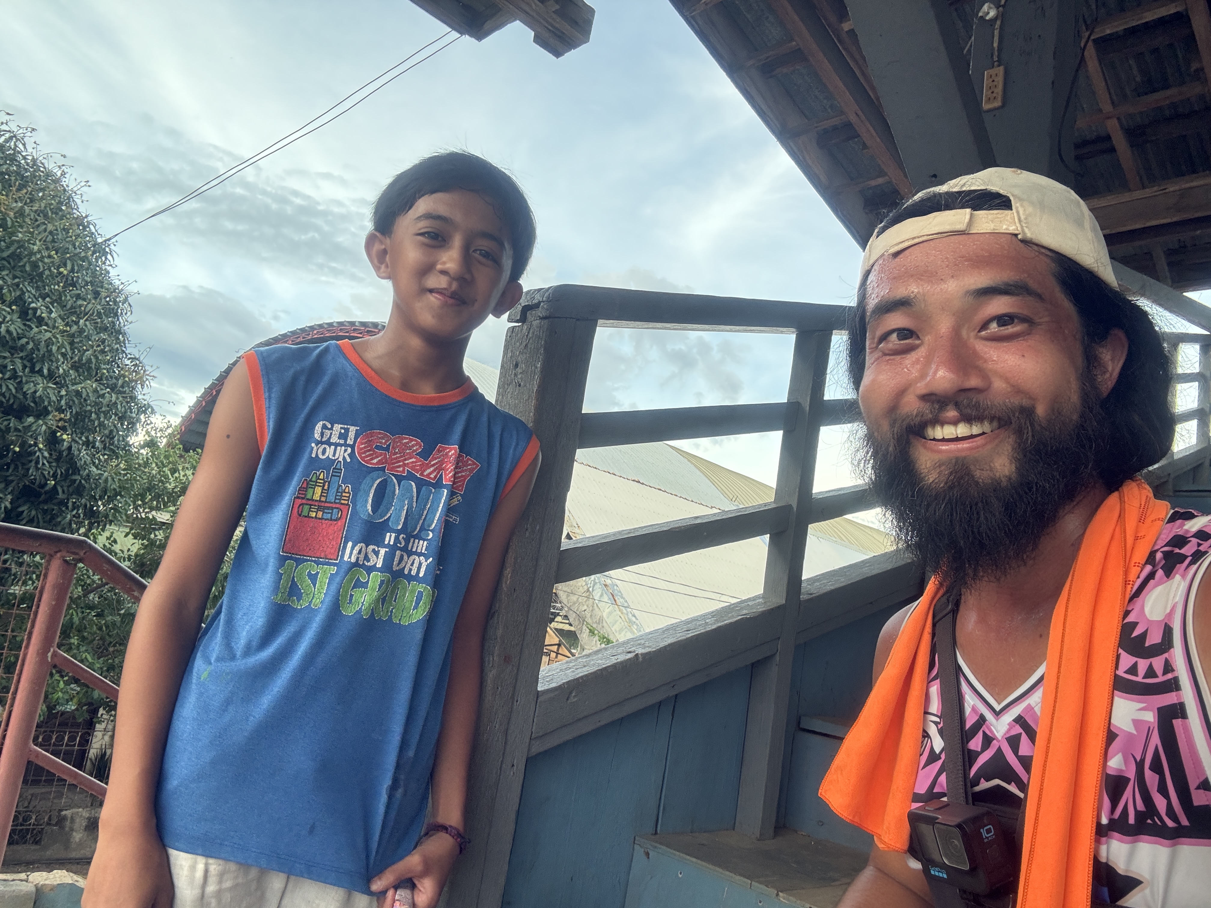 A young local boy who helped find a place to sleep for the night
