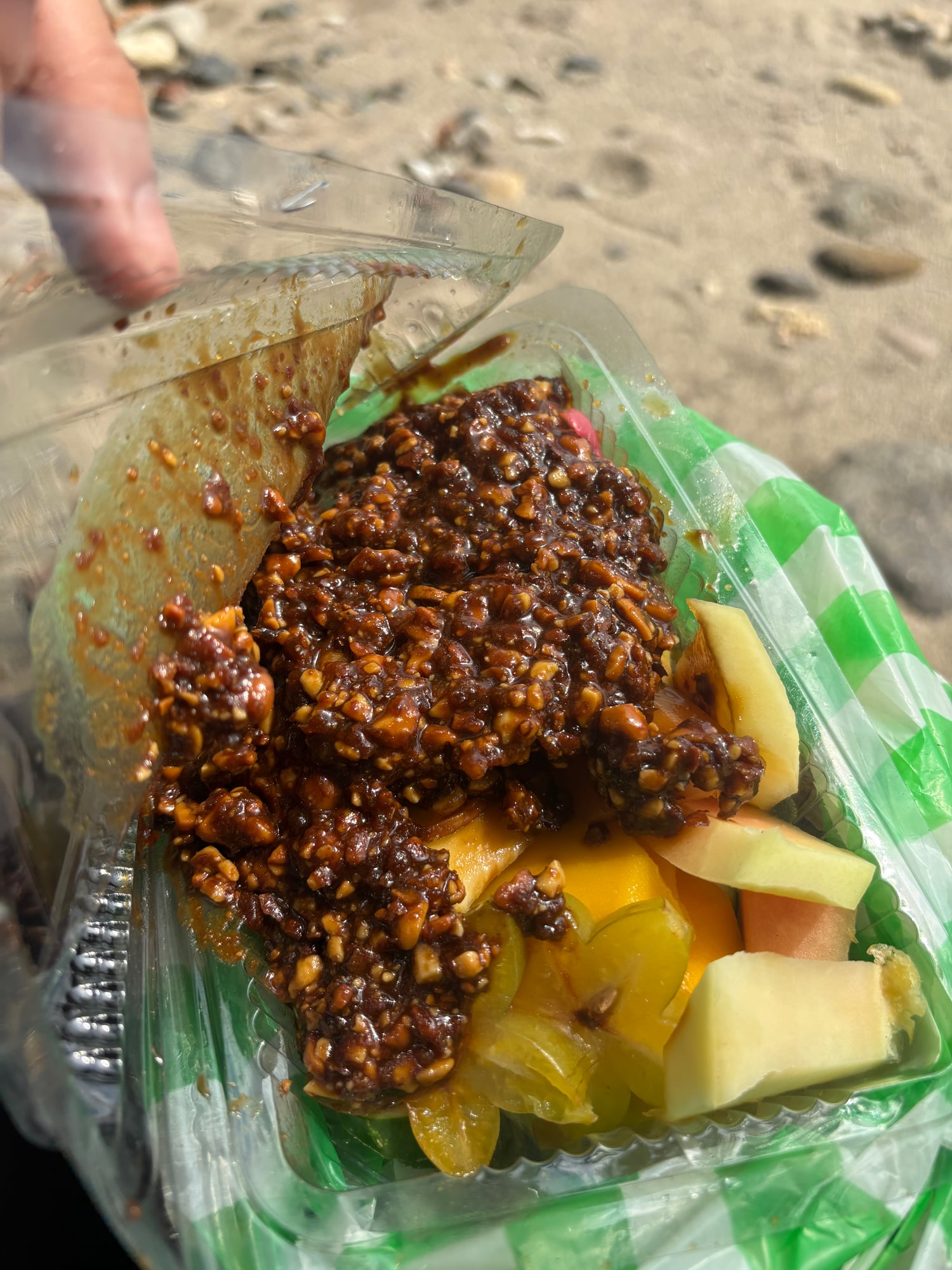 Rujak, mixed fresh fruit covered in sweet and spicy peanut sauce