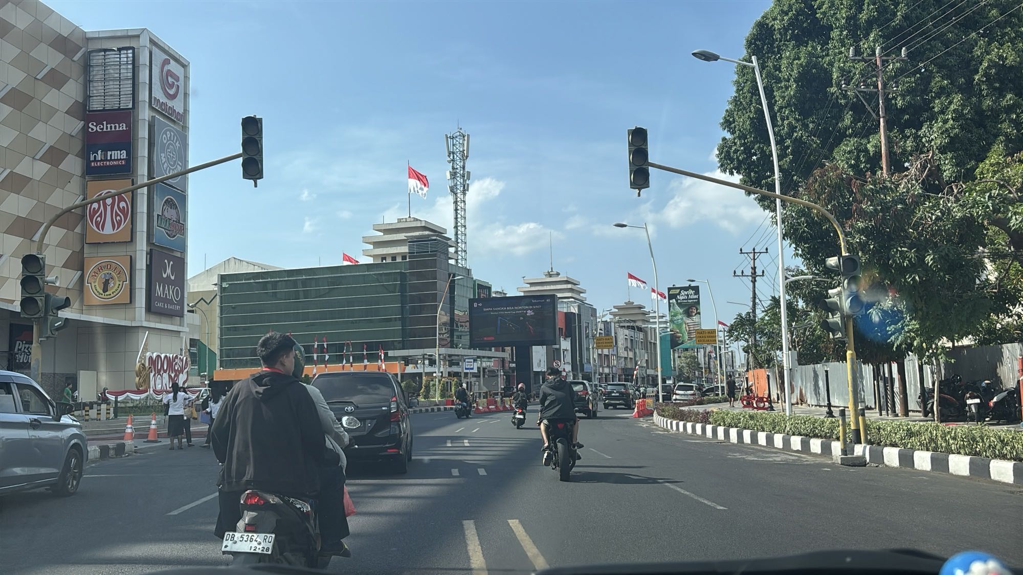 Riding through the streets of Manado on the way to the hotel