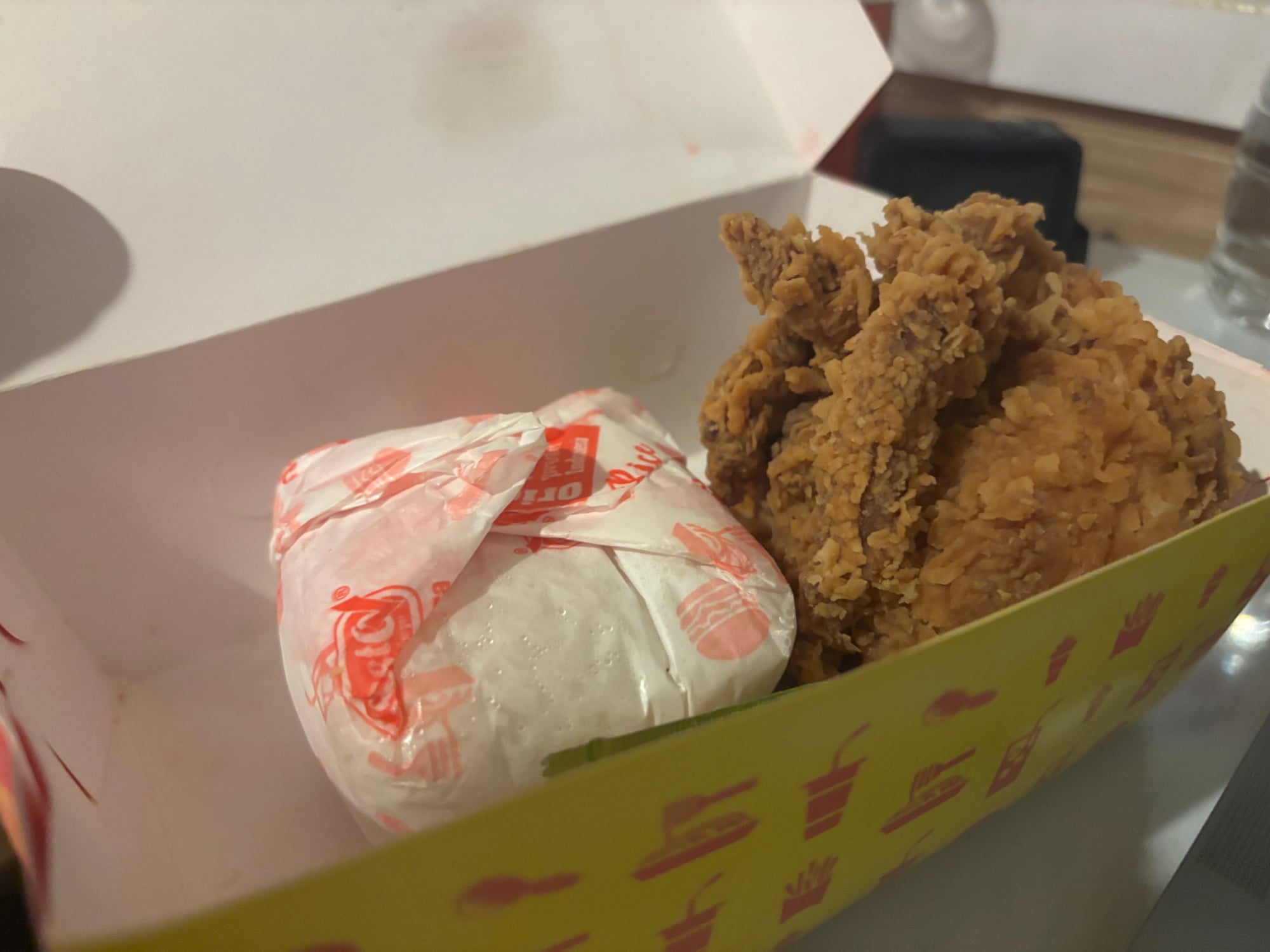 Fried chicken and rice packed up as a takeaway gift