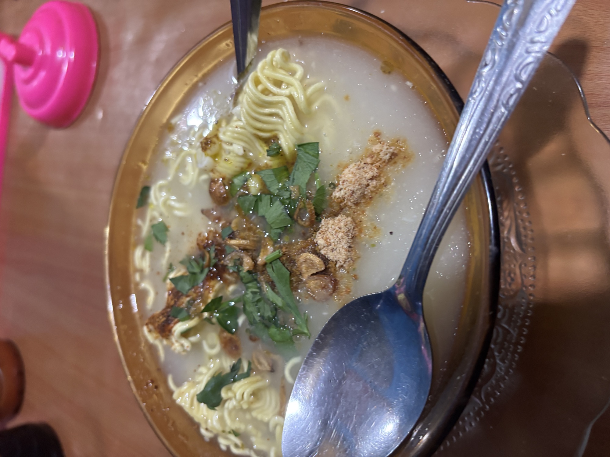 A bowl of Binte, a noodle soup loaded with sweet corn, from a Palu night stall