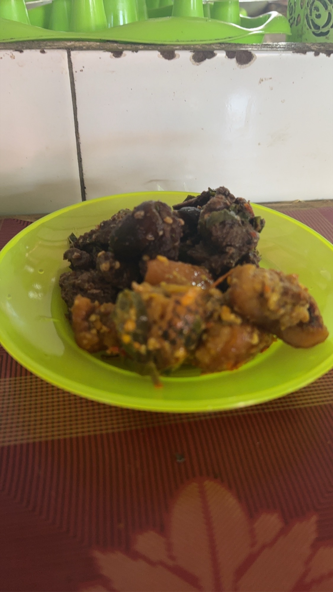 A plate with both snake and dog meat, cooked and ready to eat