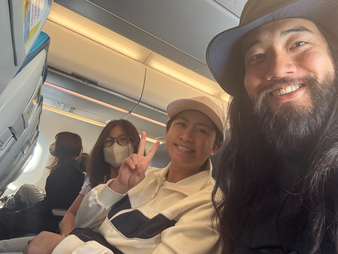 My neighbor on the flight, a Filipino heading home after years in Japan.