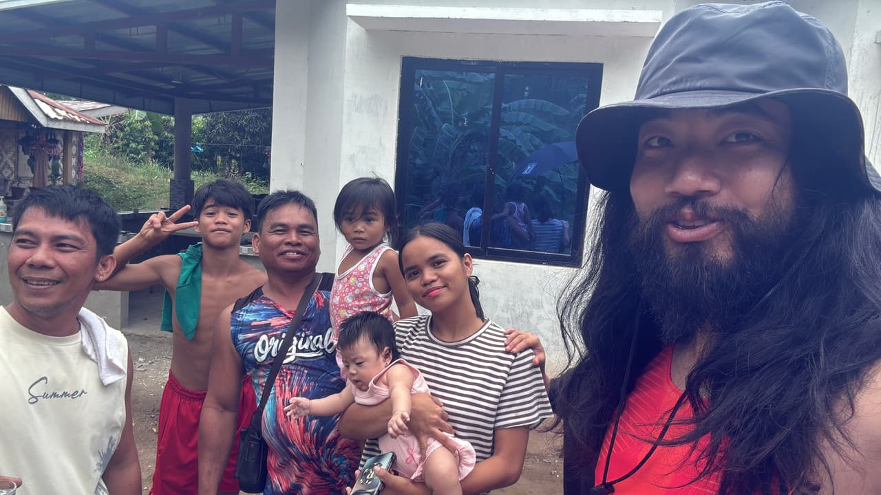 Group photo taken before leaving the jungle village