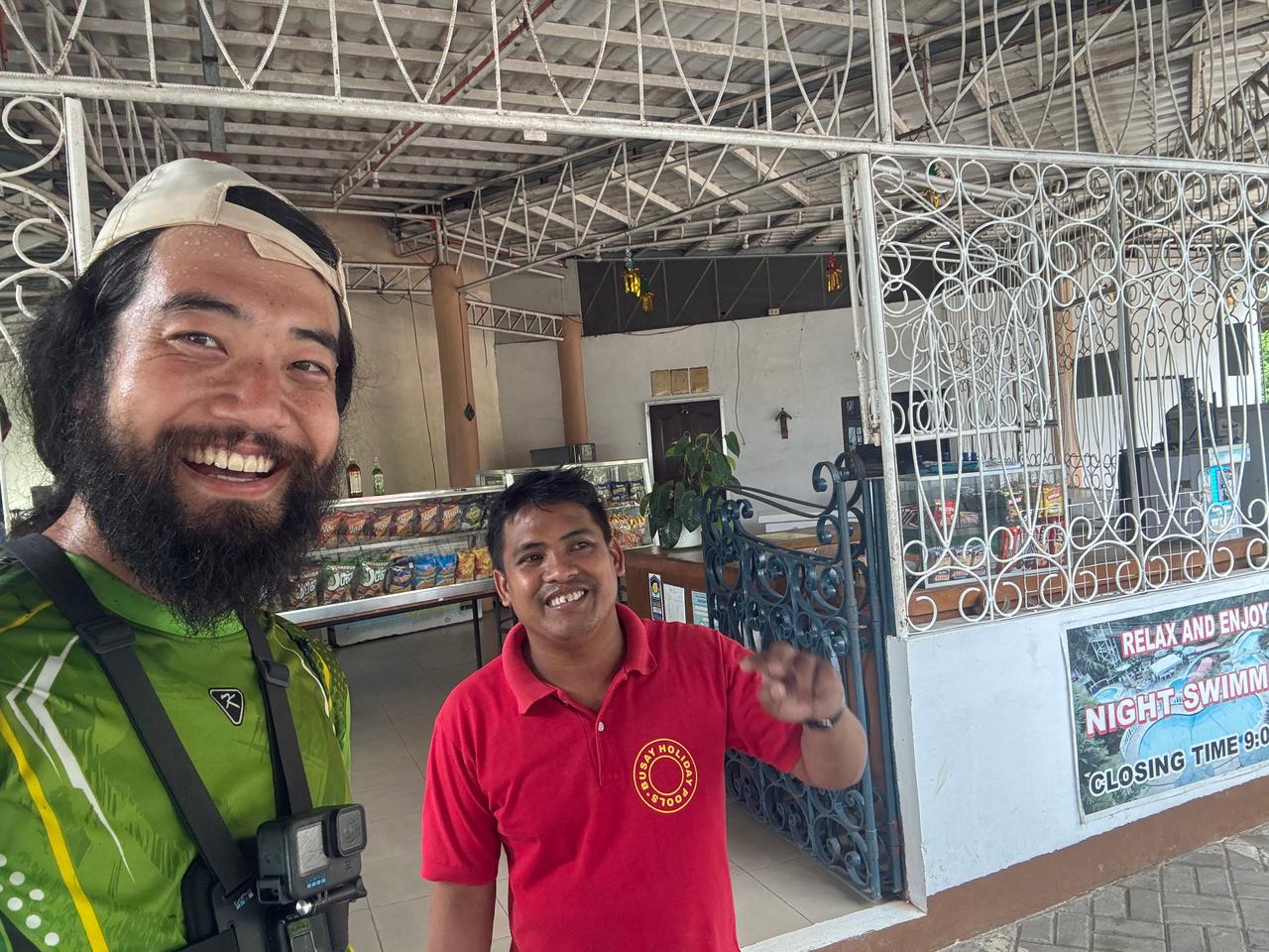 With a staff member at a resort near the campsite