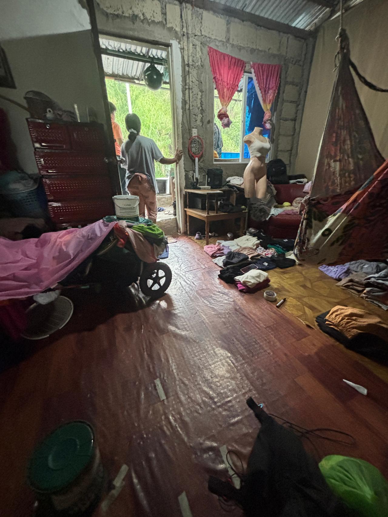 A local family who let me shelter in their home when the rain started