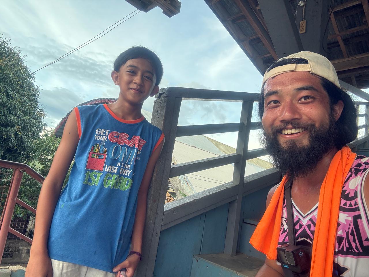 A young local boy who helped find a place to sleep for the night