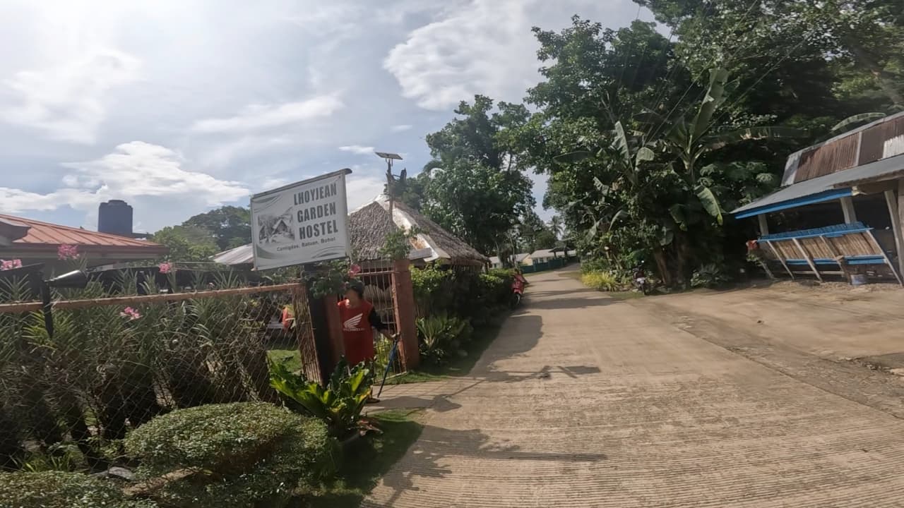 Entrance sign of Lhoyjean Garden Hostel in Cantigdas, Batuan, Bohol