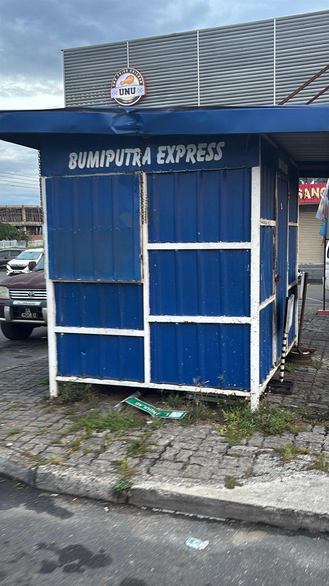 The "Bumiputra Express" kiosk along a Keningau street