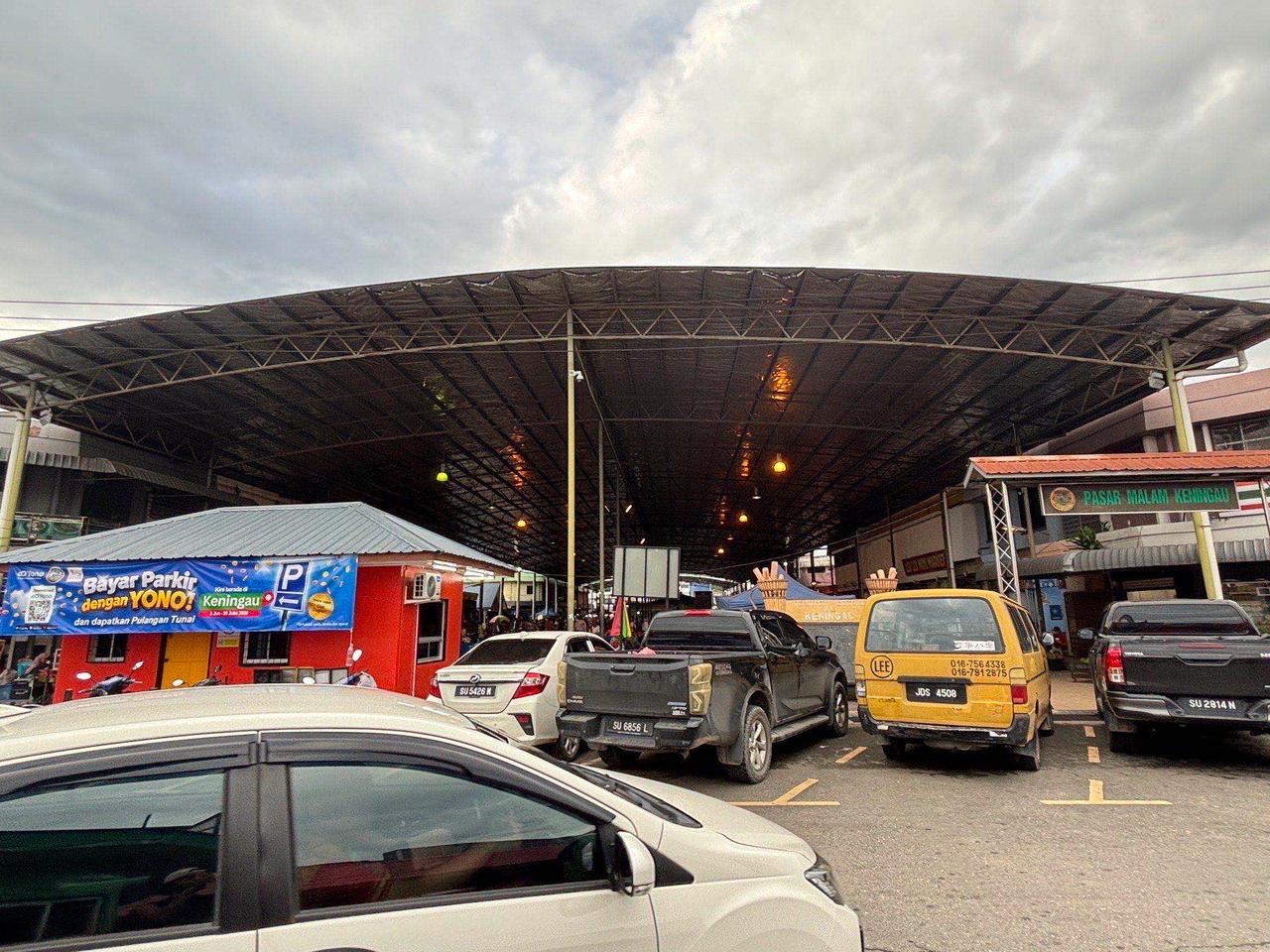 The covered "Pasar Malam Keningau" night market parking area