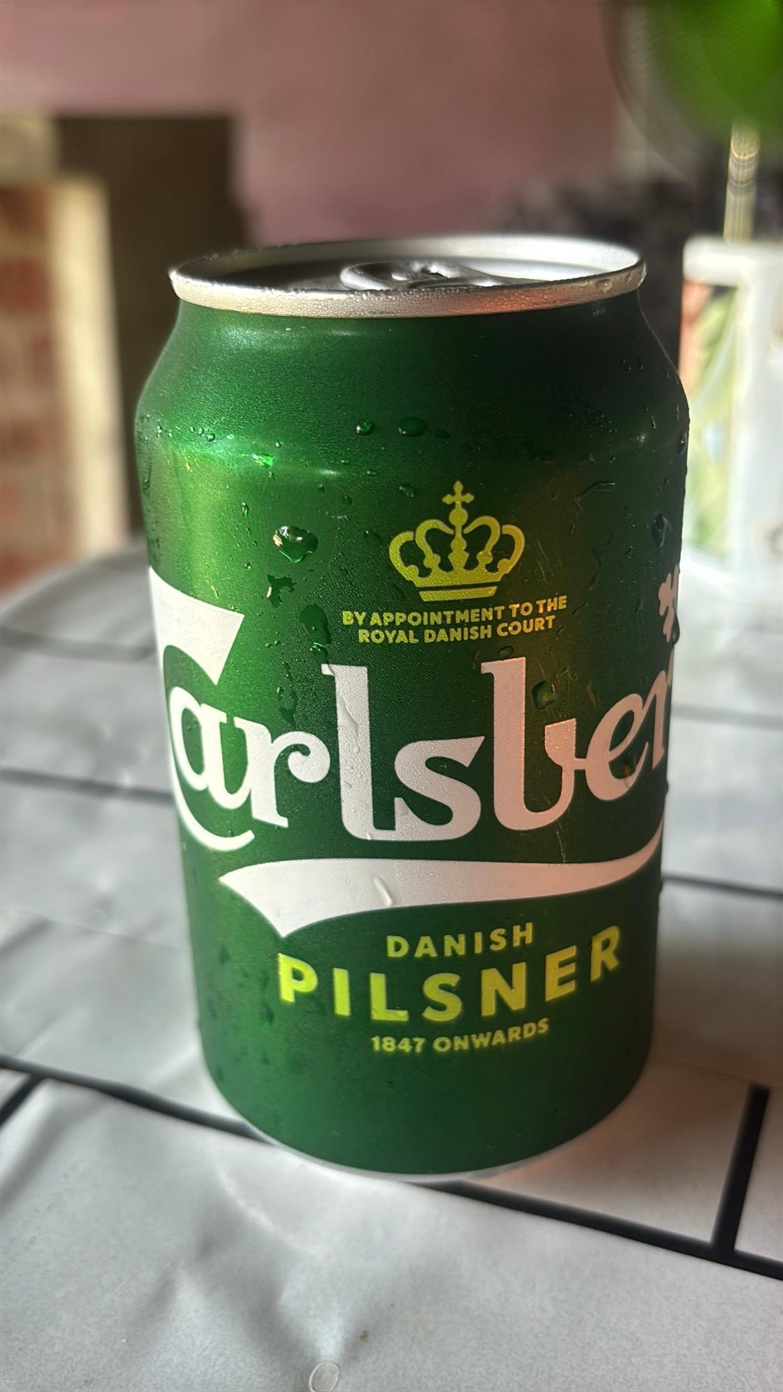 A cold Carlsberg shared with my new host during the evening