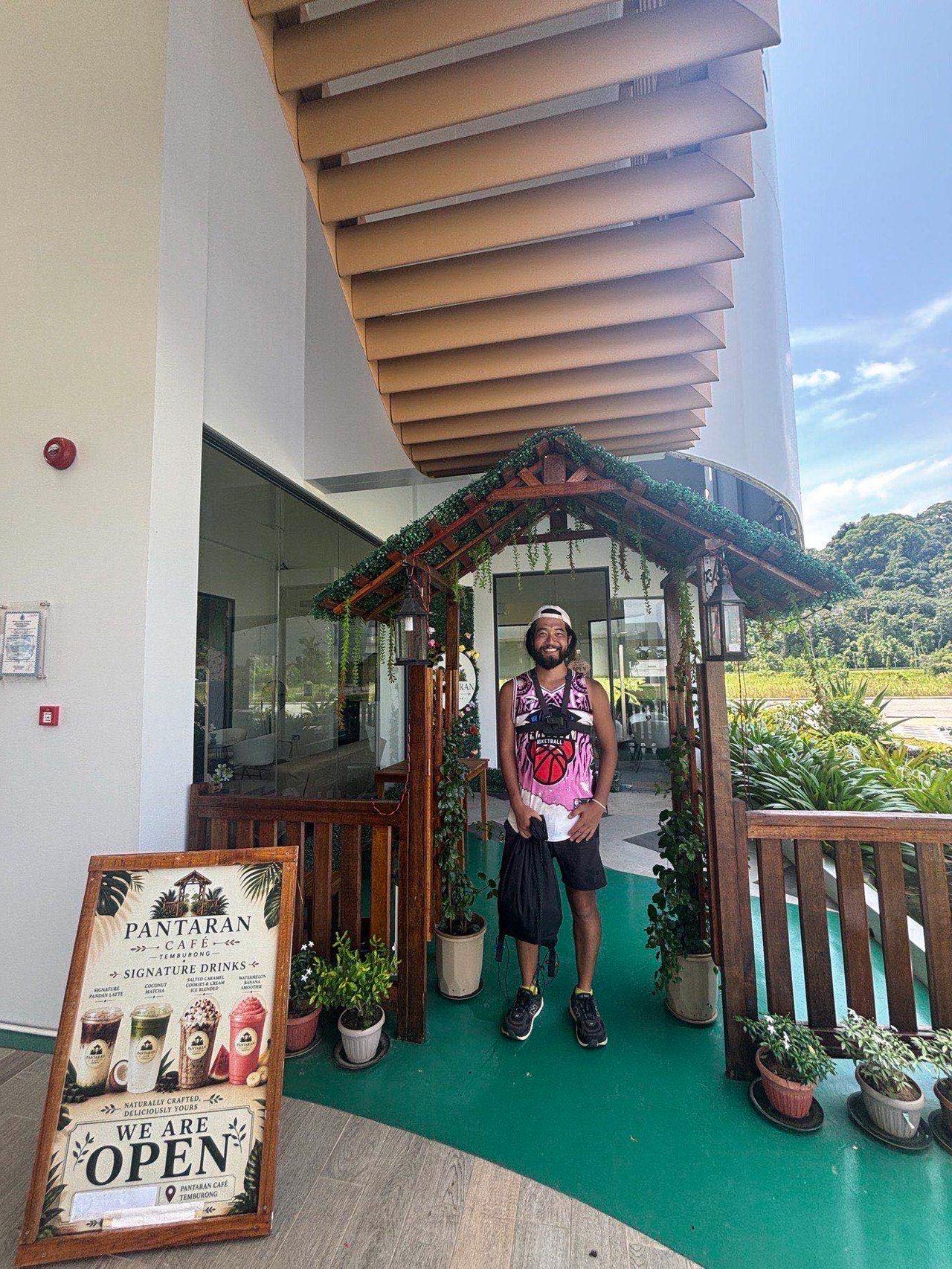Posing outside Pantaran Café in Temburong before the border crossing