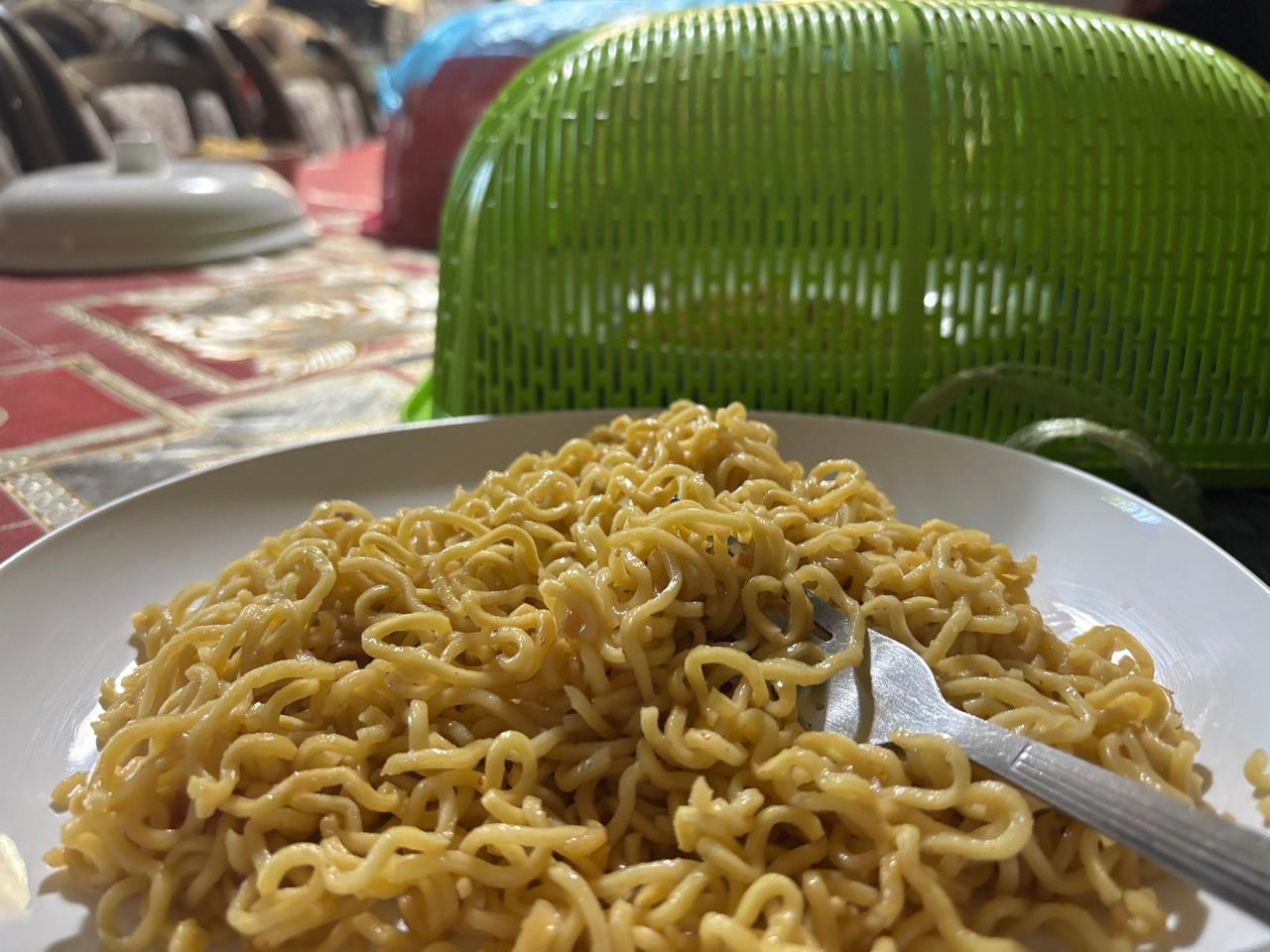 A relaxed dinner of noodles with the friends who hosted me