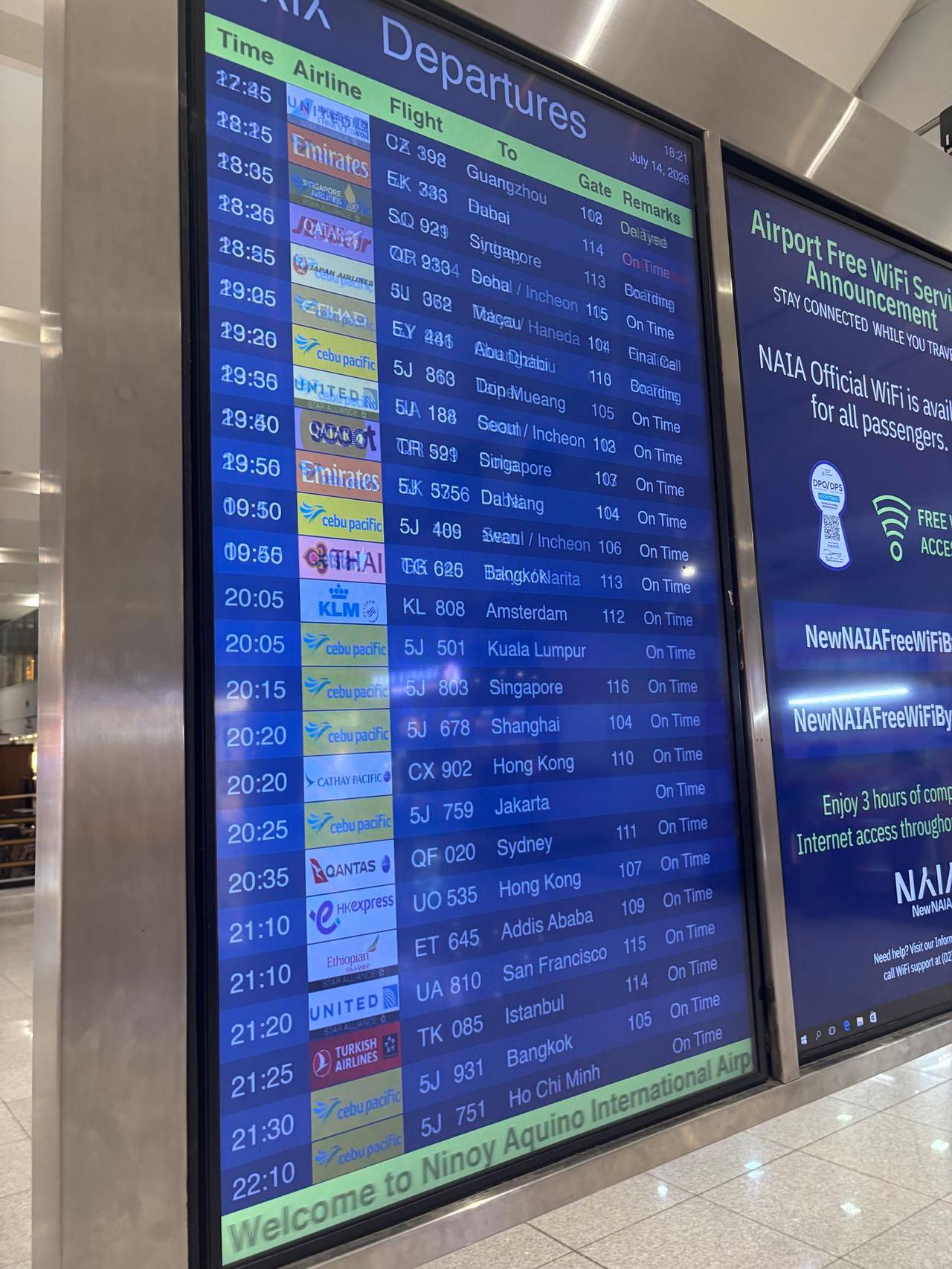 A departures board at Ninoy Aquino International Airport in Manila