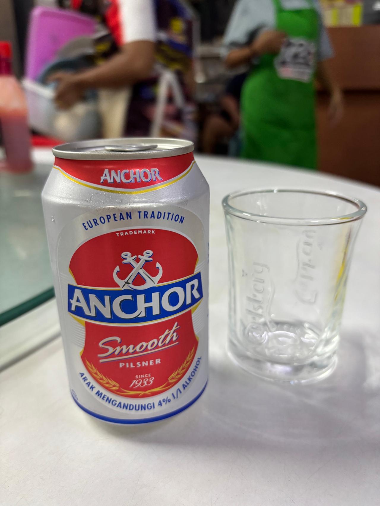 An Anchor beer and an empty glass at the Chinese restaurant