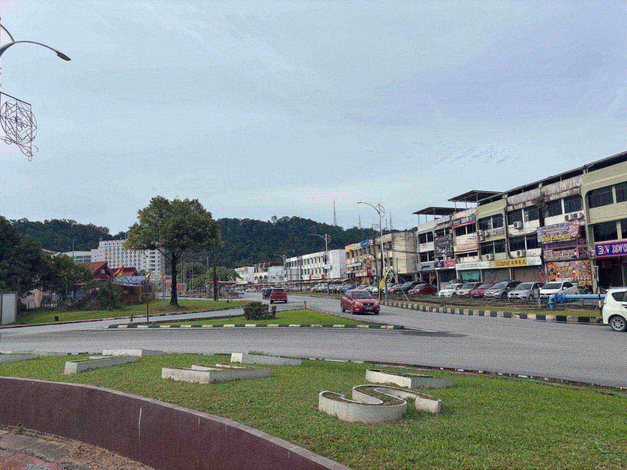 A cloudy morning over a roundabout in Limbang town