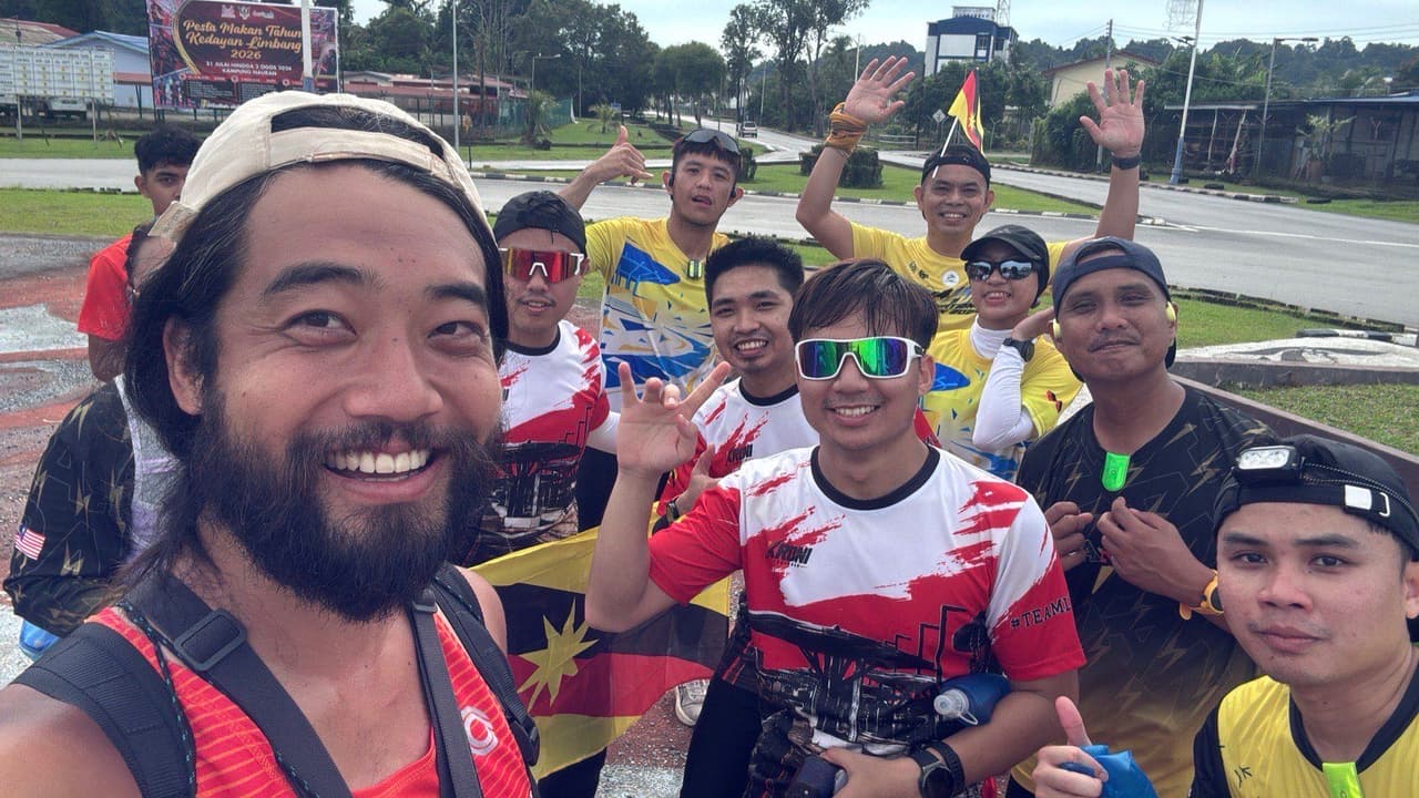 A group photo with a local running club in Limbang