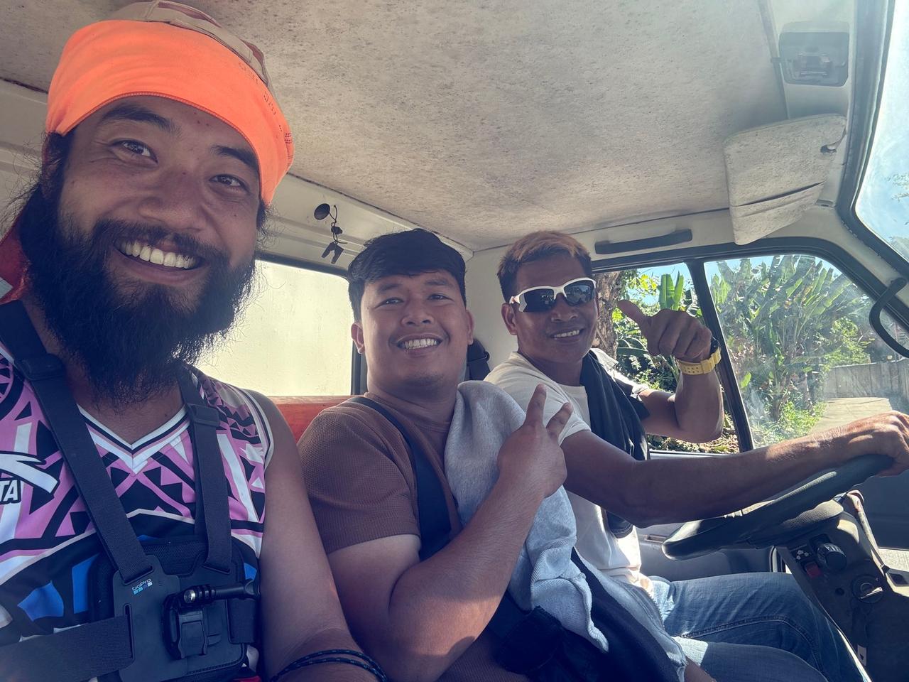 Riding along with friendly locals inside their vehicle
