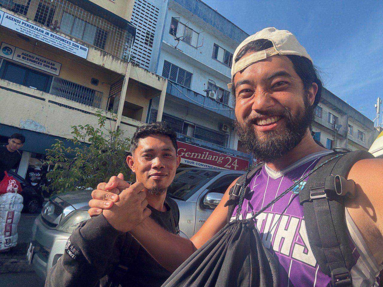 A fist bump with a friendly local on the street