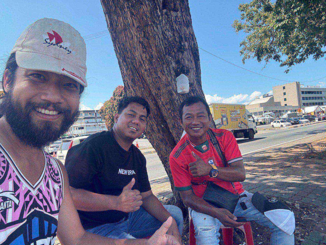 A selfie with Jack, a Toraja local, and a friend on the street