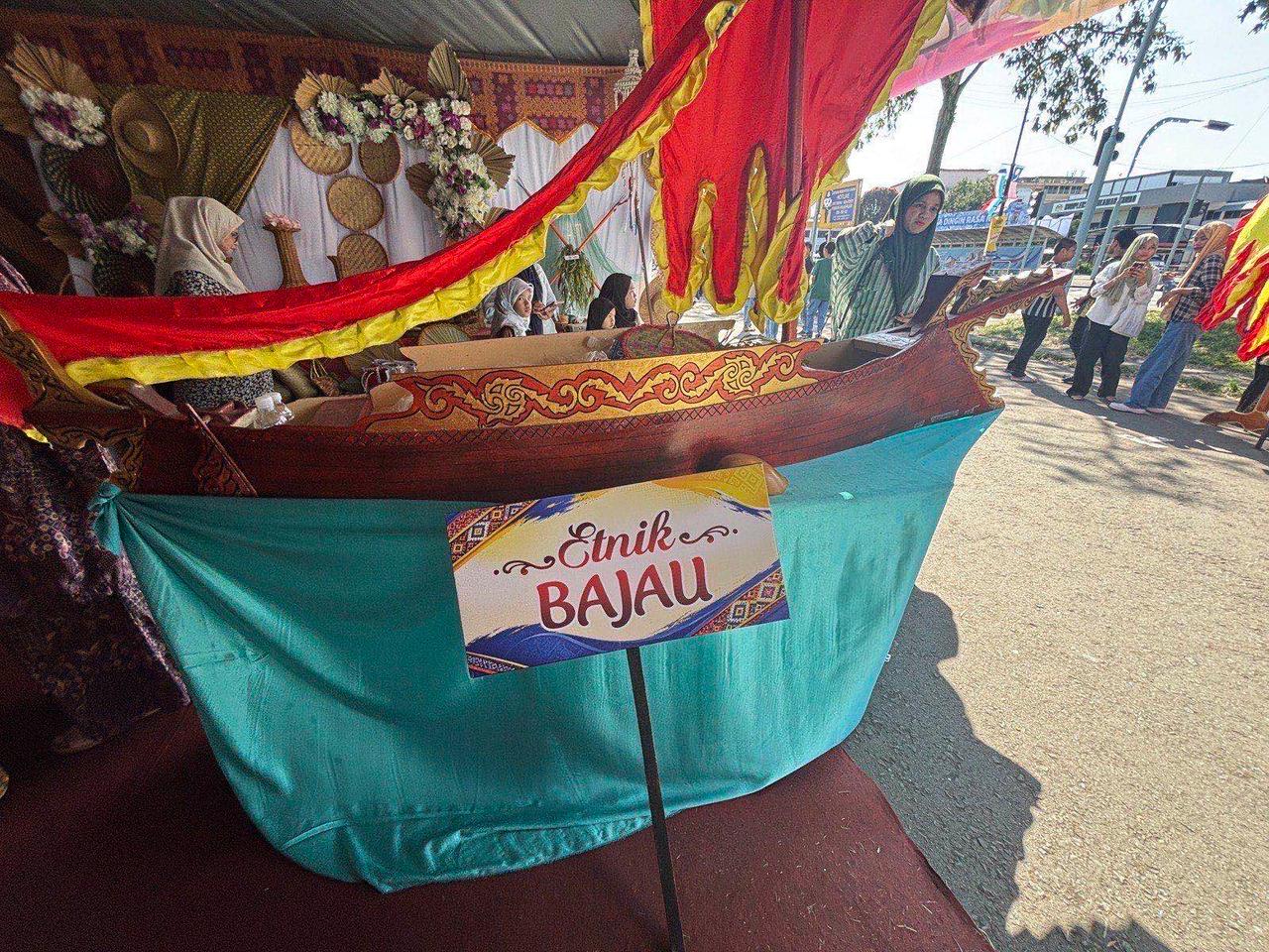 A traditional decorated boat display at the Etnik Bajau booth