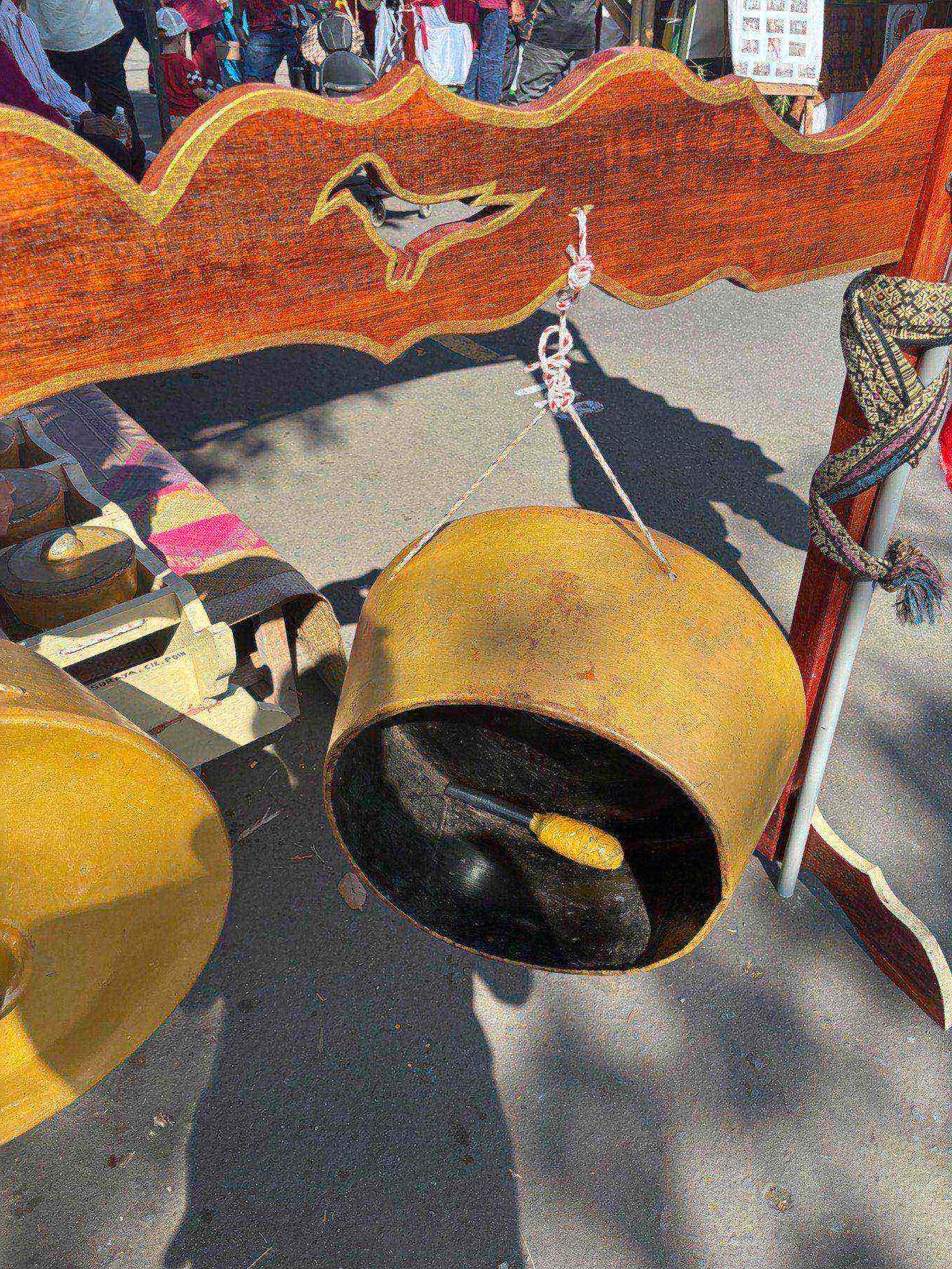 A large traditional gong hanging at the Bajau booth