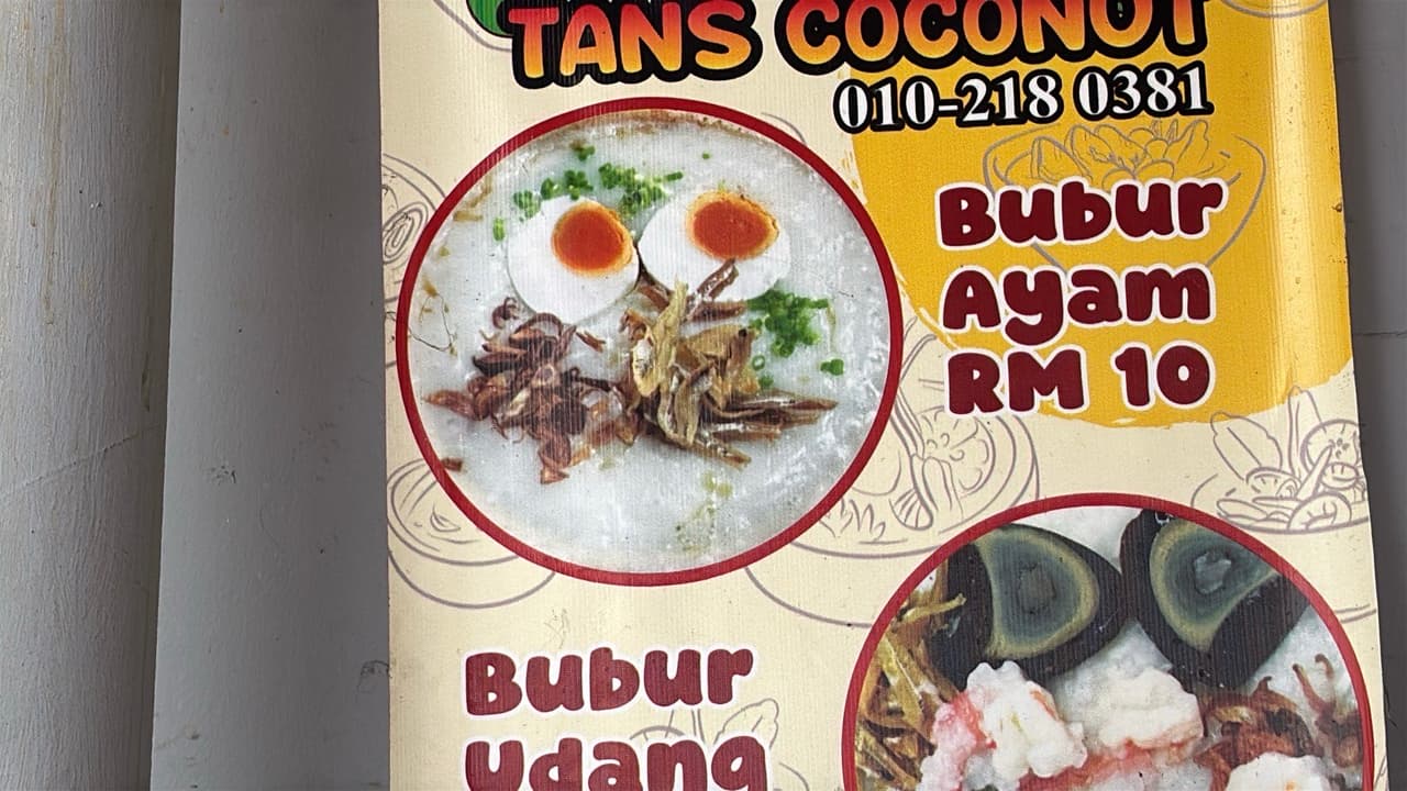 A menu sign advertising Bubur Ayam for RM 10