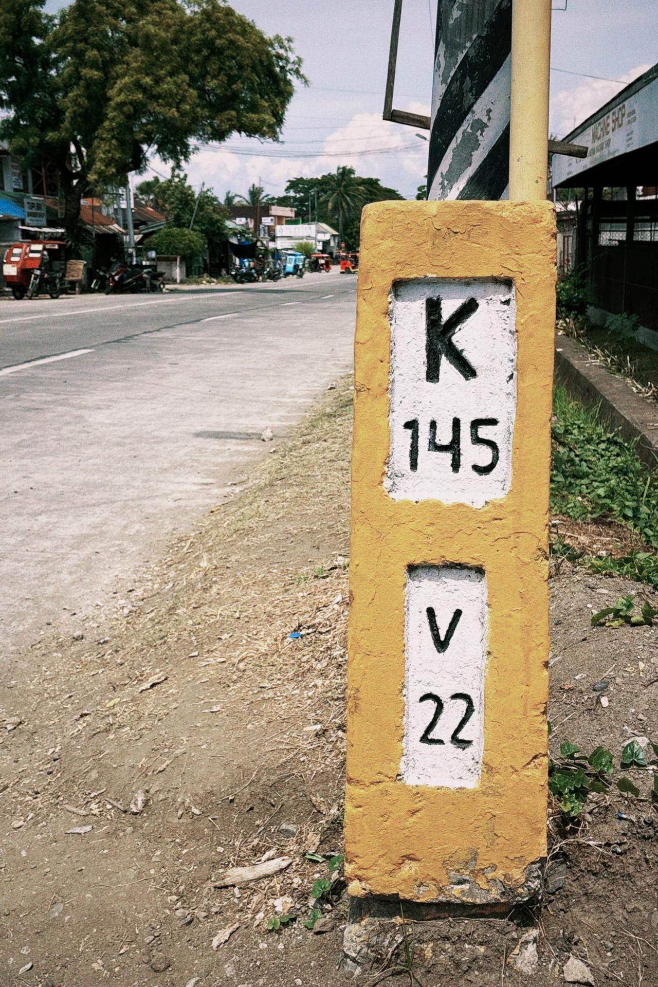Road sign showing 22km to the next major town